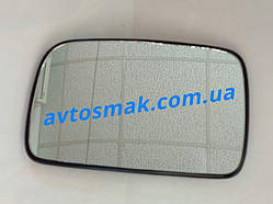 Вкладыш зеркала левый с обогревом асферич. Felicia VW  POLO 1998-01