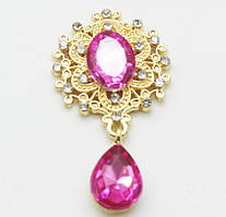 Камінь з підвісом в ажурній золотій оправі яскраво-рожевий 2,6*4,6 см