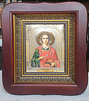 Икона великомученик в фигурном киоте темного цвета под стеклом, размер 20×18, размер лика 10×12.