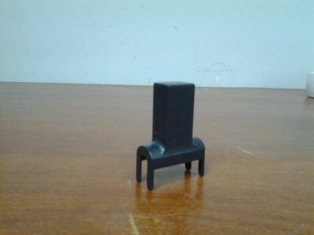 спеціальний тримач для заміни фарбувального валика