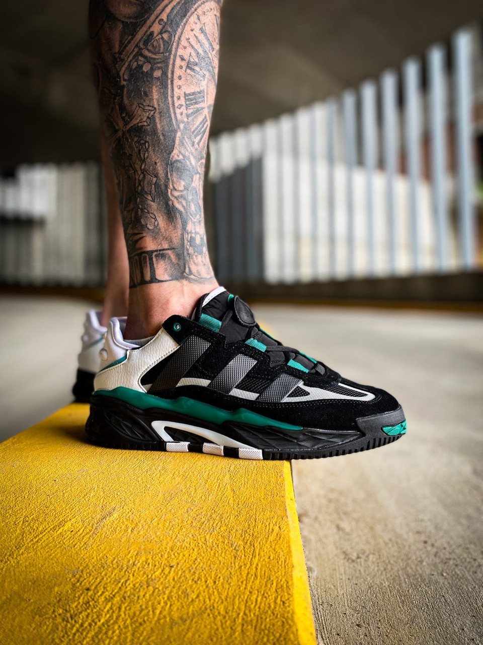 Adidas black green sales