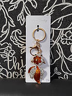 Брелок на ключі золота рибка зі стразами