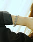 Масивний подвійний жіночий браслет з підвісками хрестиками, фото 2