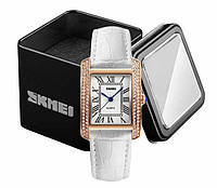 Наручний жіночий годинник Skmei 1281 на шкіряному білому ремінці в золотому корпусі