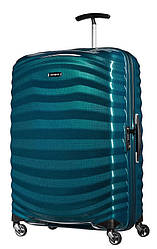 Большой пластиковый чемодан на 4-х колесах Samsonite Lite- Shock