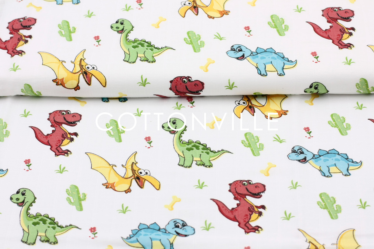 Муслин Динозаврики різнокольорові 155 см