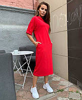 Жіноча сукня міді з рукавом до ліктя і кишенями