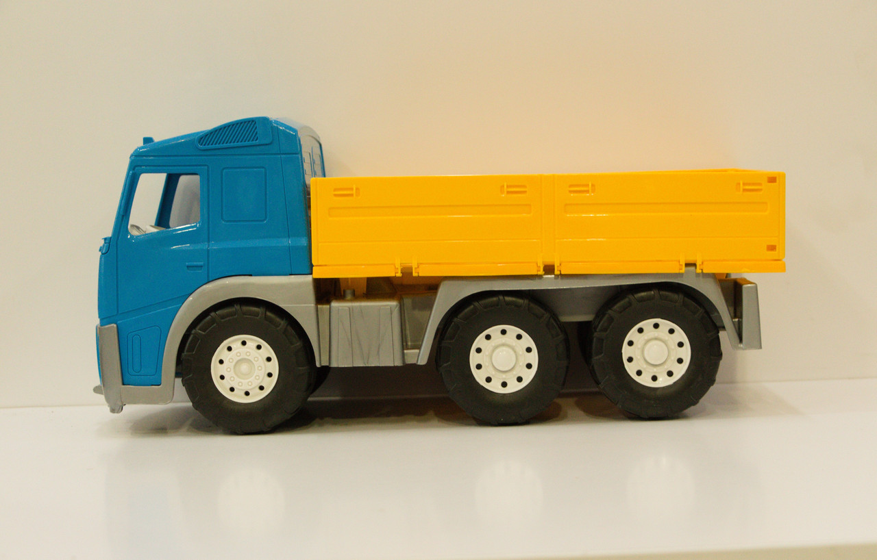 Детская пластиковая машинка для мальчика Акрос Бортовая с широкими колесами машинка для песочницы грузовик - фото 2 - id-p1454758038