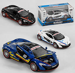 Іграшка гоночна машина Макларен П1 (McLaren P1) металева 1:32 двері відкриваються вгору світло звук 3 кольори
