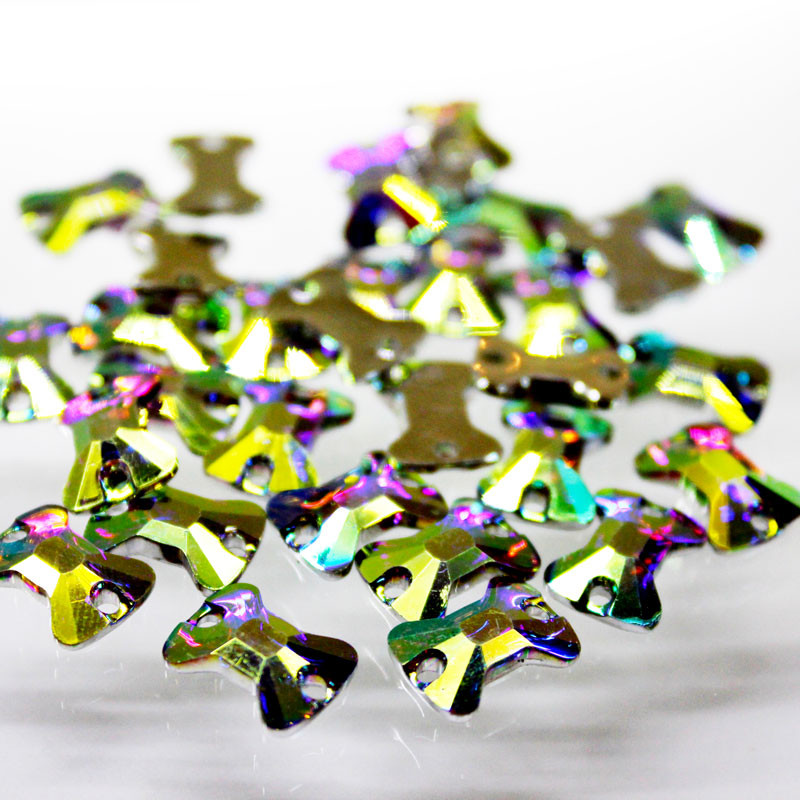 Пришивные камни(синтетич.стекло) 12х8,5мм, форма Бантик Цвет Crystal AB(хамелеон), 1шт - фото 1 - id-p115826892