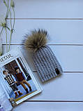 Зимова в'язана дитяча шапочка на зав'язках із натуральним бубоном для дівчинки ручної роботи., фото 8