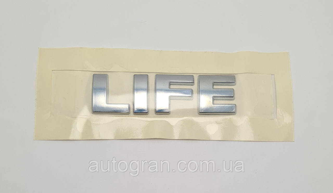 Емблема напис багажника VW Caddy LIFE
