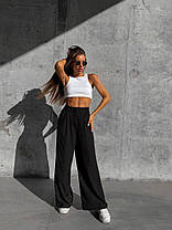 Жіночі трендові брюки палаццо вільні з кишенями Bld179, фото 5