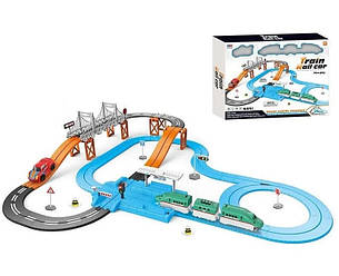 Іграшкова залізниця з автотрасою, залізницею, машинками і аксесуарами, працює від батарейок