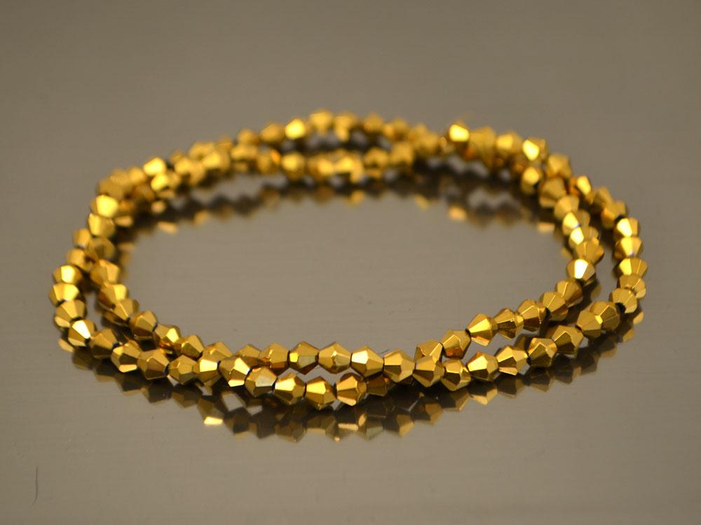 Біконуси кришталеві 4 мм, колір золото, нитка, фото 1