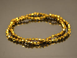 Біконуси кришталеві 4 мм, колір золото, нитка