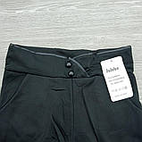 Жіночі зимові жіночі брюки на хутрі з кишенями спереду, ґудзик, Jujube чорні розмір L, 30032198, фото 6