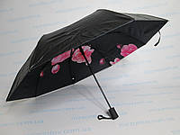 Жіноча парасолька напівавтомат верх чорний, низ квіти.