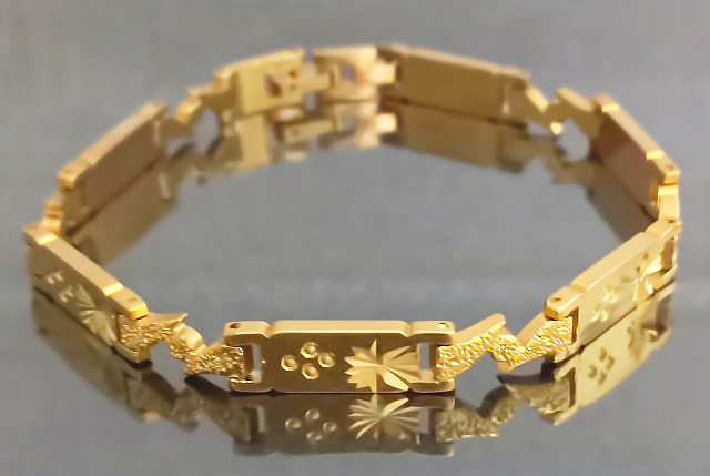 Браслет Аthena зі сталі. Позолота 18К. Довжина: 20 см. Ширина: 6 мм.