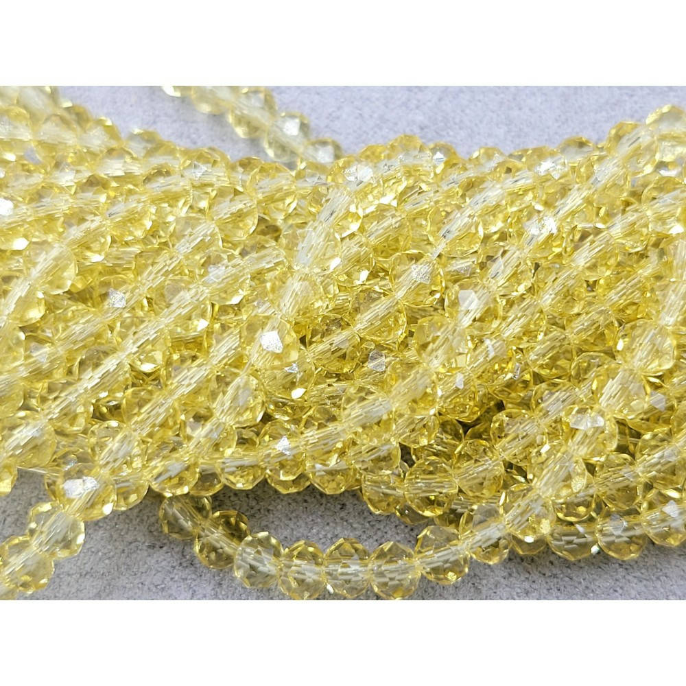 

Хрустальные бусины(рондель). Размер 4 мм. В упаковке прим.140 шт. цвет - желтый бледный