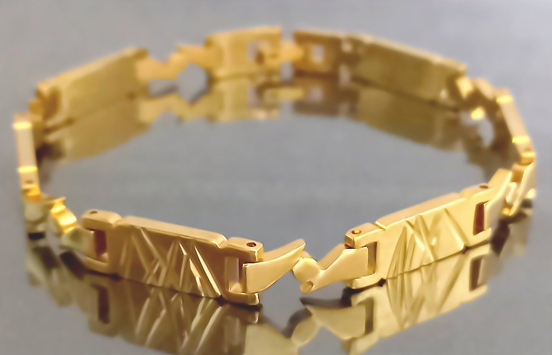 Браслет Аthena зі сталі. Позолота 18К. Довжина: 20 см. Ширина: 6 мм.