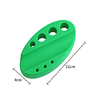 Подставка зеленая силиконовая для ручки и колпачков.
