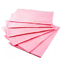 Нагрудники стоматологічні тришарові текстуровані серветки 125шт (рожеві)