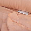 Лляна щільна костюмна тканина з "ефектом пом'ятості" світло - персикового кольору