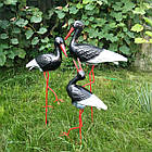 Сім'я з трьох чорних лелек для саду - садові фігури з кераміки на металевих лапках)