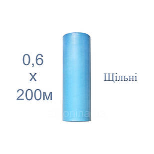 Одноразові простирадла блакитні 0,6х200м щільні, спанбонд на кушетку