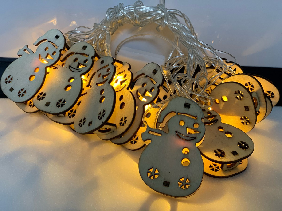 Світлодіодна декоративна гірлянда 10 LED 2 м дерев'яні фігурки сніговики прозорий шнур золотистий, фото 1