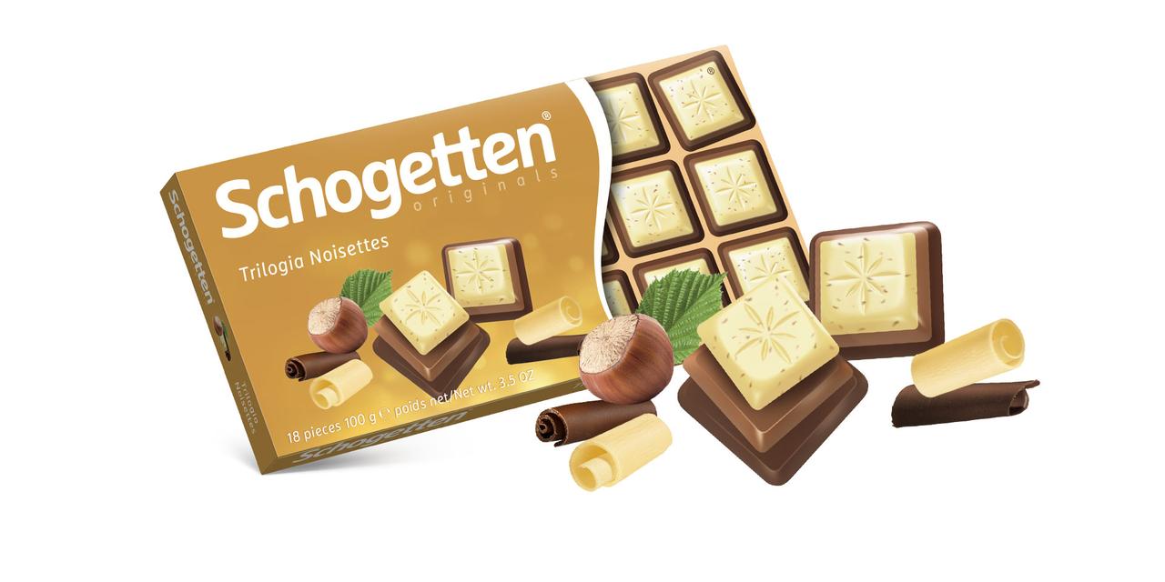 Schogetten Trilogia мікс білого та молочного шоколаду зі шматочками лісового горіху 100 грамів, фото 1