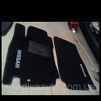 Килимки на Nissan Tiida
