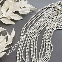 Ланцюжки, стрічки зі стразами і намистин.