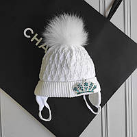 Біла демісезонна шапка для новонароджених з короною