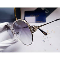 Брендовые женские очки круглой формы Chopard SCHC02S