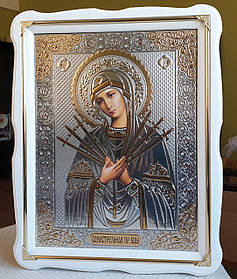 Ікона Семістрельна Богородиця в білому дерев'яному фігурному кіоті з декоративними куточками, розмір 37*47