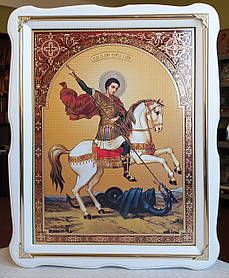 Ікона Святий Георгій Побідоносець у білому дерев'яному кіоті під склом, розмір кіота 37*47, сюжет 30*40.