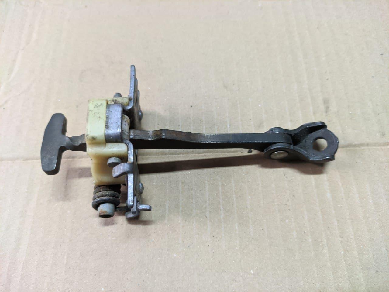 Обмежувач передніх дверей Renault Megane 3, 2008-2016, 804310007R (Б/У)