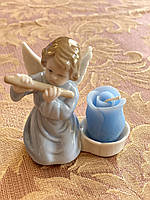 Ангел, що грає на флеті зі свічкою HERVIT