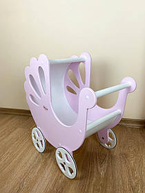 Іграшкова дерев'яна рожева коляска для ляльок.