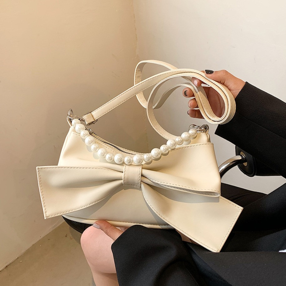Женская сумка клатч с элегантным бантом - фото 1 - id-p1481936010