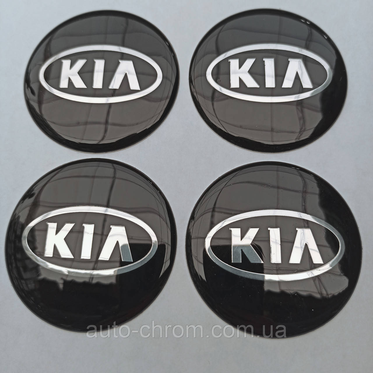 Наклейка опукла на ковпачок диска Kia 65 мм чорна