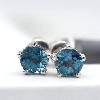 Сережки-пусети срібні, пологові, з блакитним Лондон-топазом.