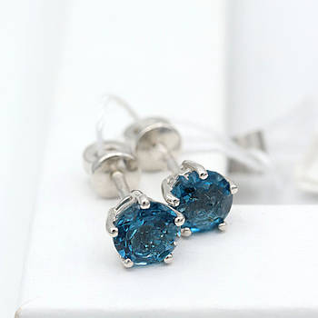 Сережки-пусети срібні, пологові, з блакитним Лондон-топазом.