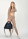 Стильна жіноча спортивна сумка з екошкіри з двома ручками і довгим ремінцем через плече чорна, фото 4