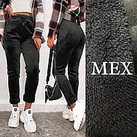 Теплі жіночі штани з велюру на хутрі