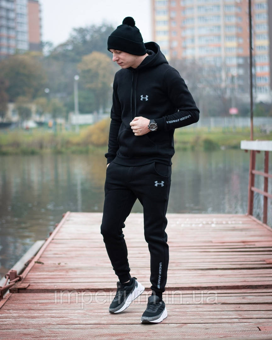 Трикотажний чорний костюм з капюшоном з сірим логотипом under armour