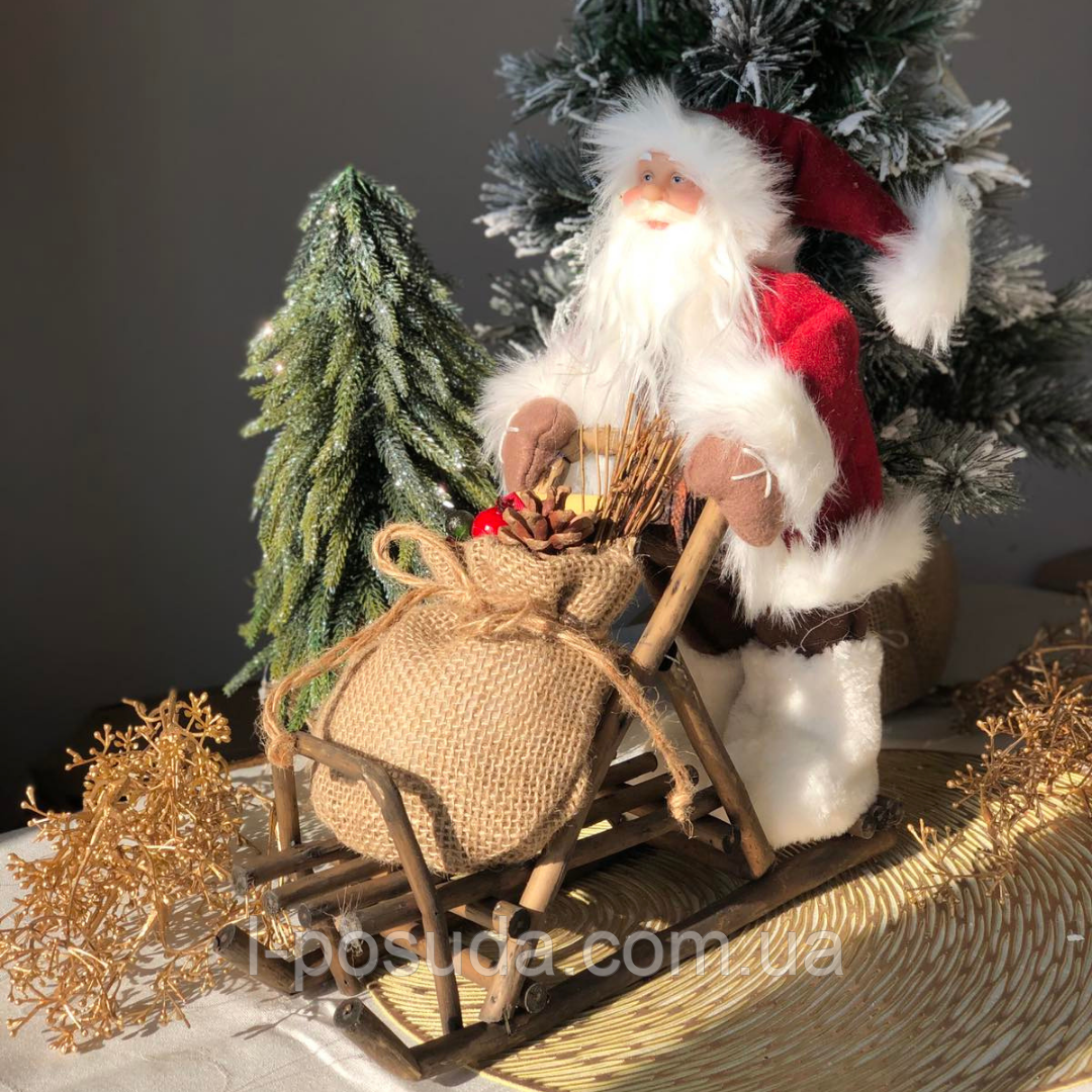Новорічна декоративна іграшка Дід Мороз з мішком на санях