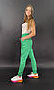 Спортивні утеплені штани джогери з накаткою-печаткою трехнитка на флісі колір зелений, фото 5